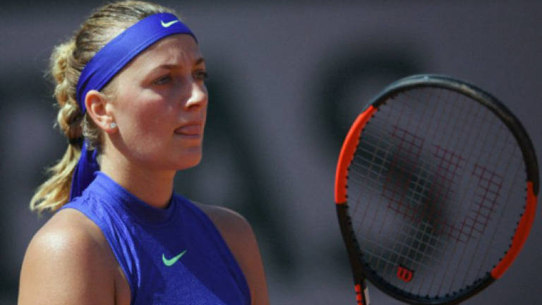 Kvitova hammers out Wimbledon warning