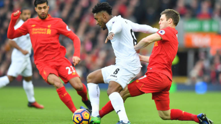 Klopp laments 'passive' Liverpool after Swansea shock
