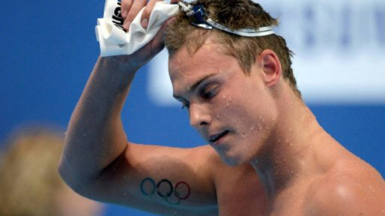 USADA says banned Russia swimmer failed drug test