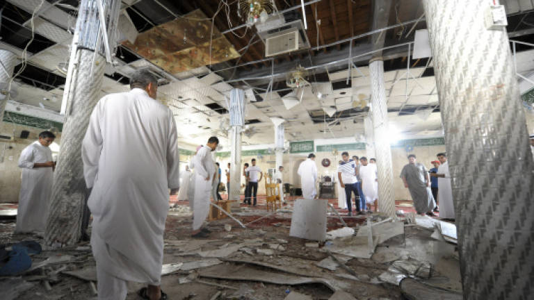 Suspects in Saudi suicide bombing to face justice: King