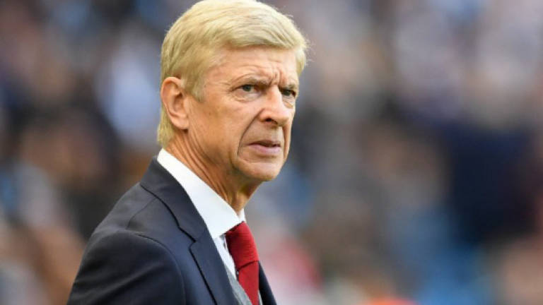 Wenger vows to fix power shift in Spurs showdown