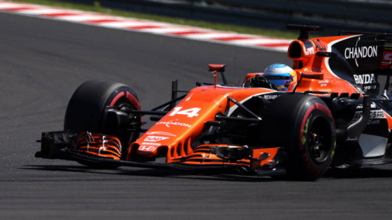 Birthday boy Alonso takes 'kamikaze' route to season best