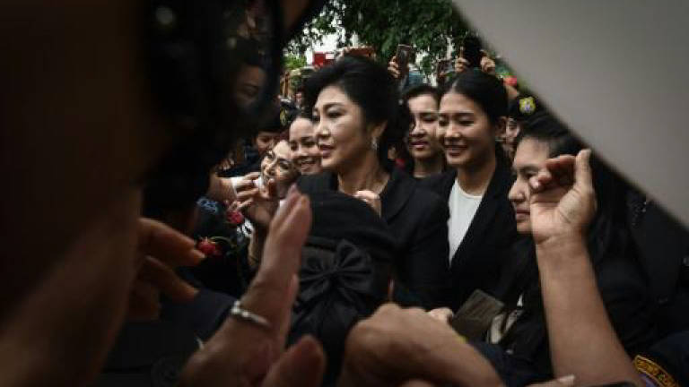 Thai authorities freeze ousted PM Yingluck's bank accounts