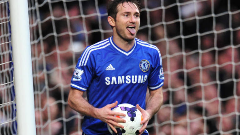 Former Chelsea star Lampard retires at 38