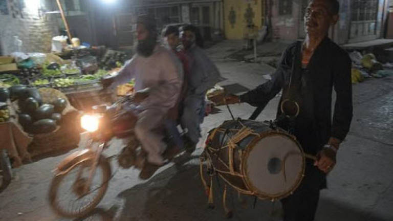 The beat is fading for Pakistan's Ramadan drummers