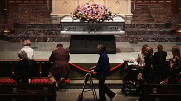 Past presidents, family and friends bid farewell to Barbara Bush