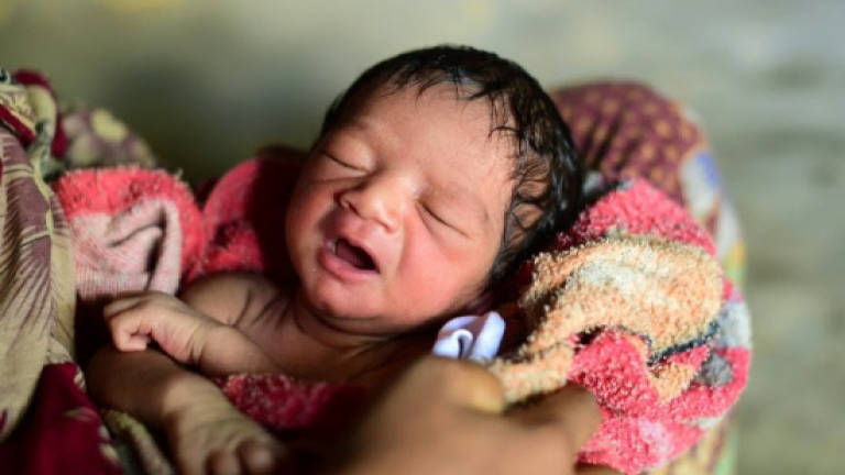 Rohingya boy born in refugee camp faces uncertain future