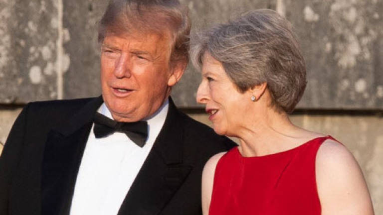Trump torpedoes May's Brexit strategy on UK visit