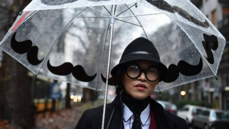 Sparkling in the rain: Milan's street style wannabes