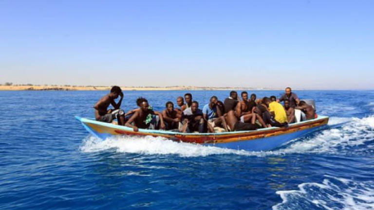 Eight migrants dead off Libya as Italy outlines naval mission