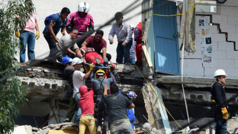 Nearly 140 killed in powerful Mexico quake