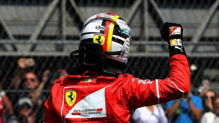 Vettel keeps hopes alive with Mexico pole, Hamilton in third