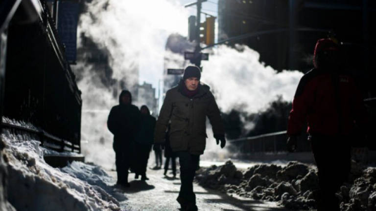 Arctic blast chills US, Canada in JFK airport meltdown