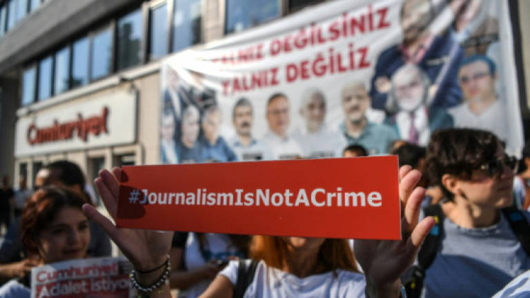 Turkey slams top court for 'wrong decision' on journalists
