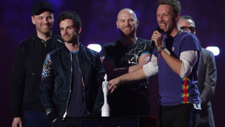 Coldplay releases piano ballad in surprise new music