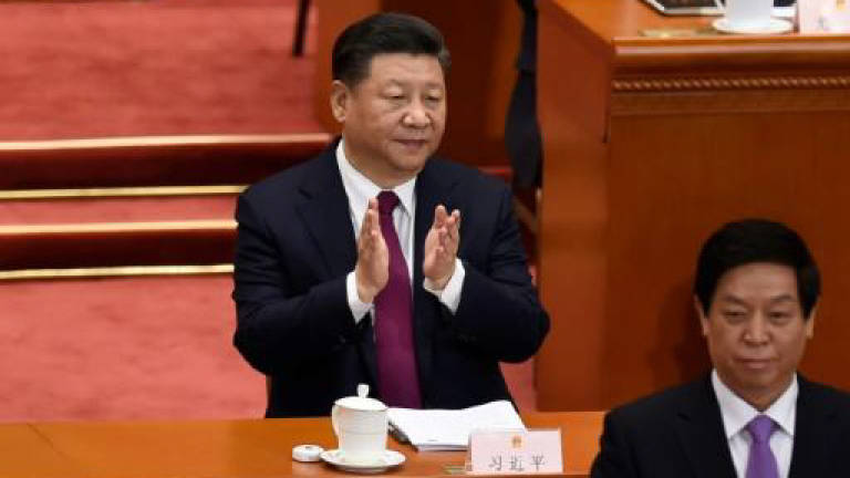 Xi: From graft-fighting governor to president for life