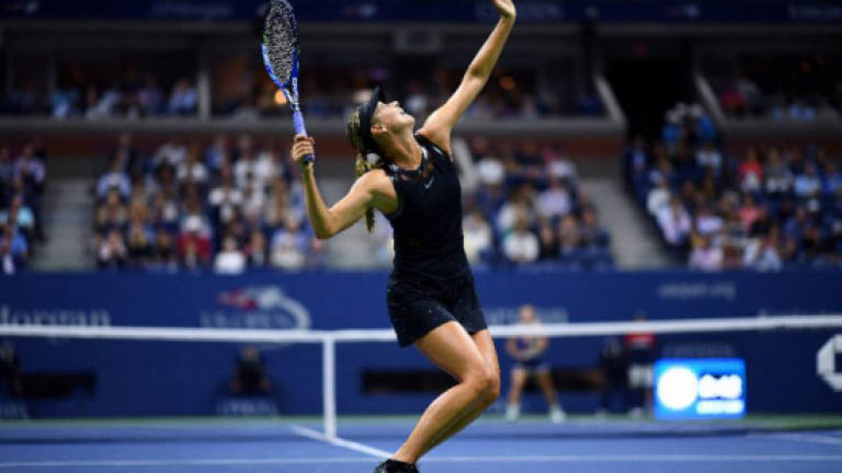 Sharapova gets down to business at US Open