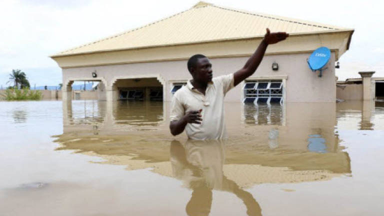 100 die in severe flooding in Nigeria