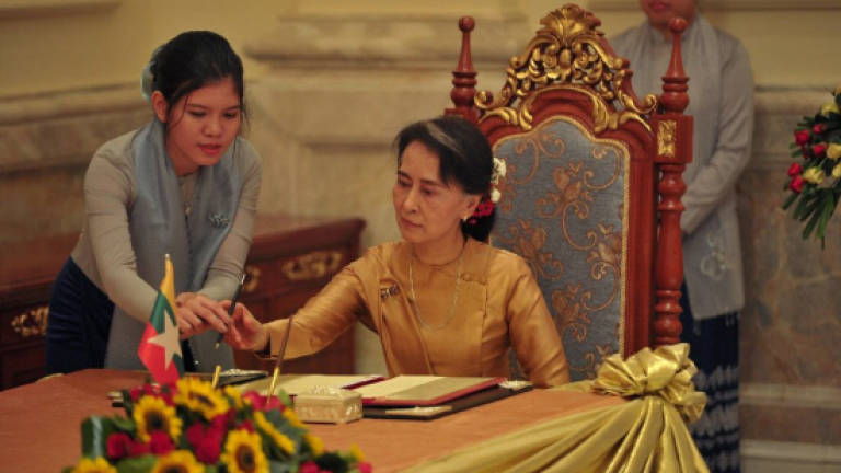 Myanmar's Suu Kyi in China with dam project on agenda