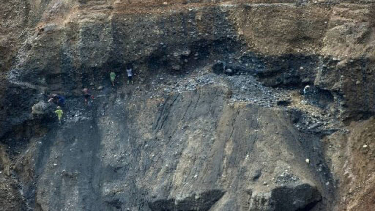 12 dead in Myanmar jade mine landslide, many feared missing