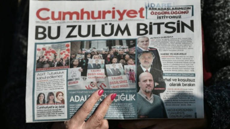 Turkey newspaper staff back on trial after almost 500 days jail