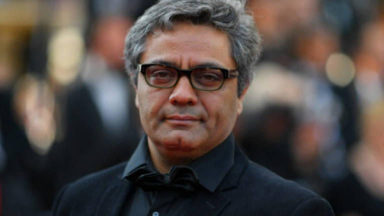 Dissident Iranian director wins top Cannes prize