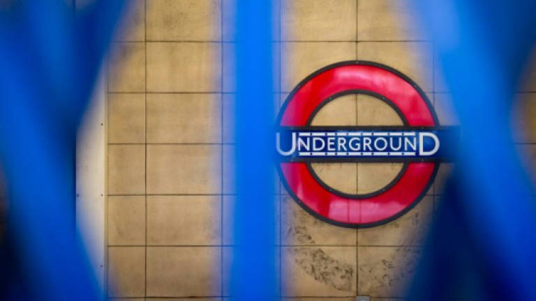 Police probe 'terrorist' London Tube stabbings