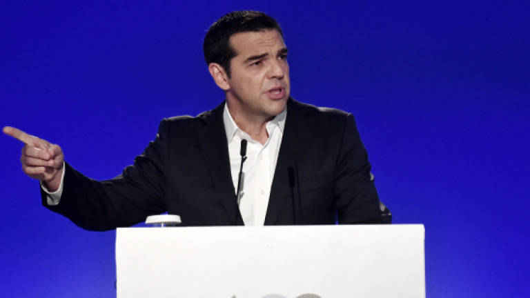 Tsipras boasts turning Grexit to 'Grinvest'