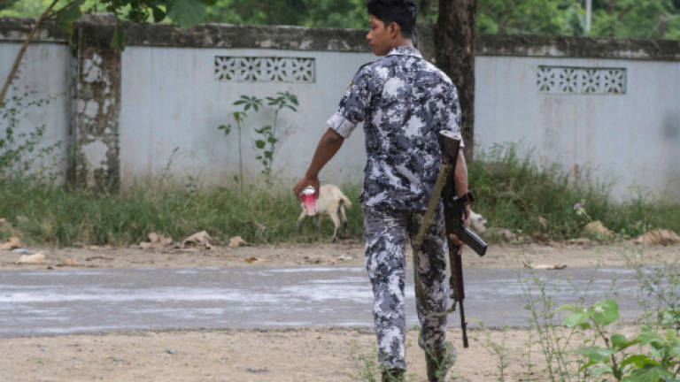 Four dead as Myanmar hunts culprits behind border raids