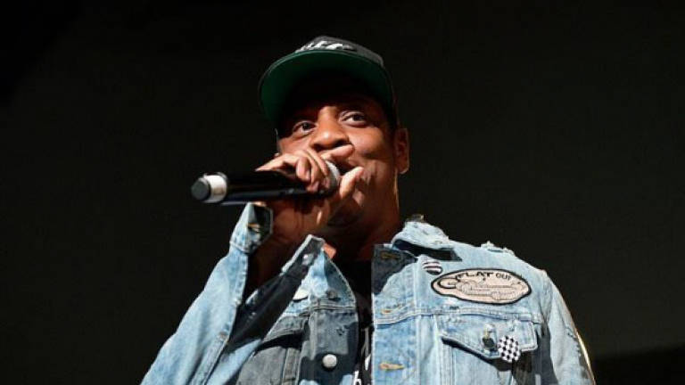 Jay-Z extends record for No. 1 albums - one week late