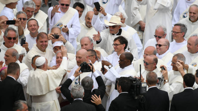 Pope scolds clergy over their part-time availability