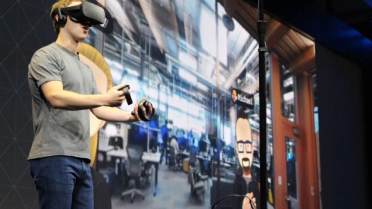Facebook's Oculus pushes virtual reality with new gear