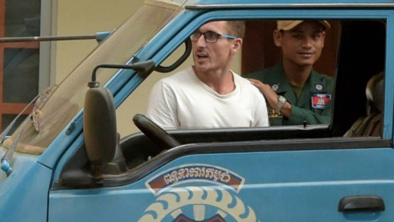 Briton apologises in Cambodia 'pornographic party' trial