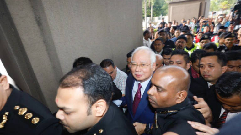 Najib arrives at court