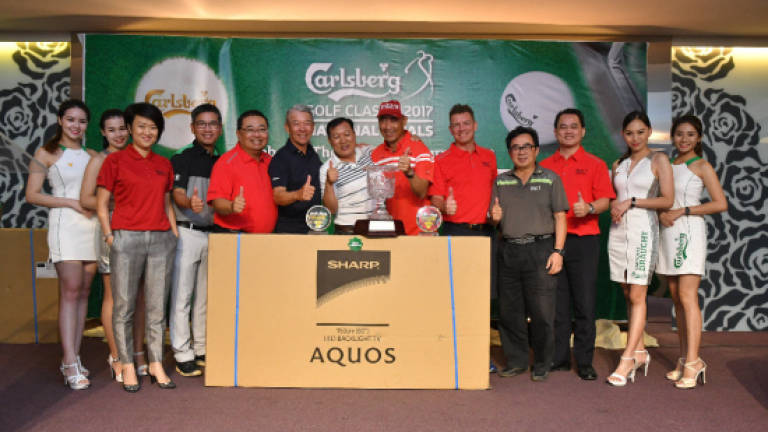 Chia rides hot putter to win Carlsberg Golf Classic championship title