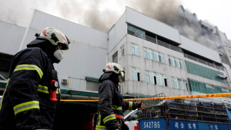 Five firefighters among 7 dead in Taiwan factory blaze