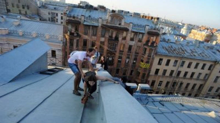 'Roofers' get a thrill exploring St. Petersburg from up high