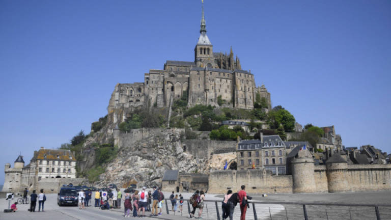 France's Mont Saint Michel evacuated as man threatens police