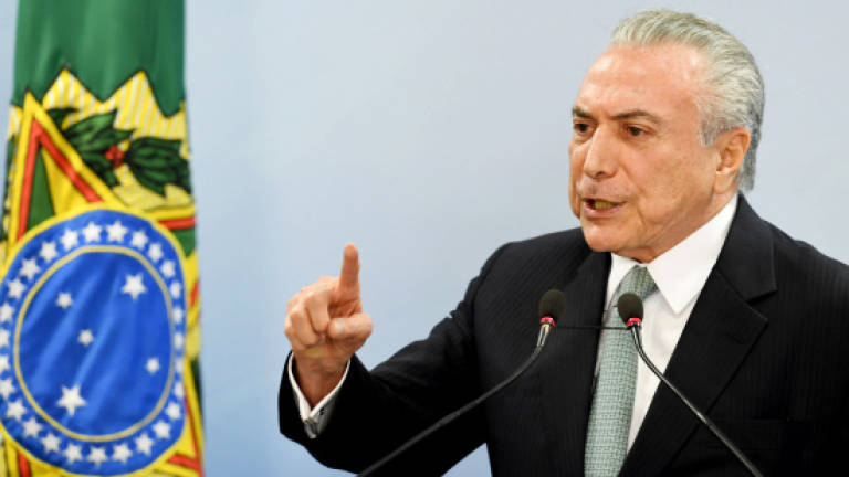 Brazil's Temer refuses to quit in corruption probe