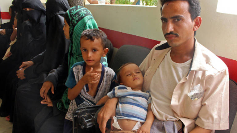 Assault on Yemen's Hodeida halted as UN pursues talks
