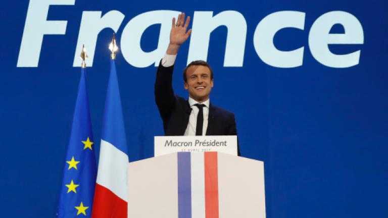 Macron, Le Pen set for final French duel