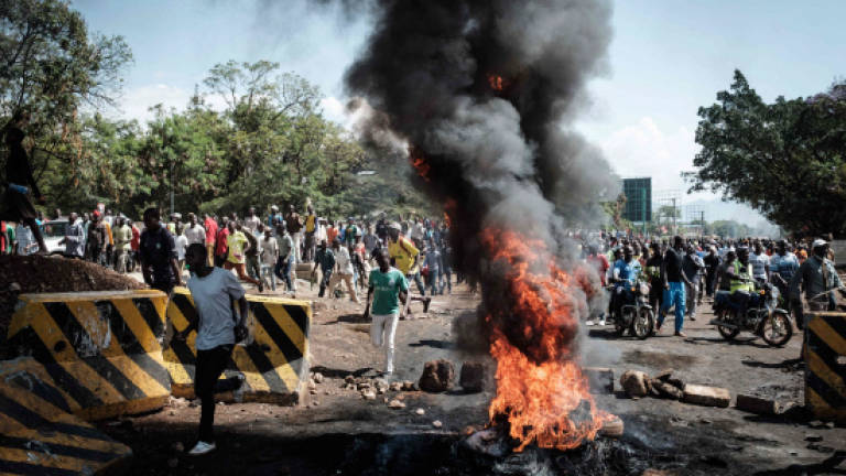 Several hurt in protests as Kenya election officials mull next move