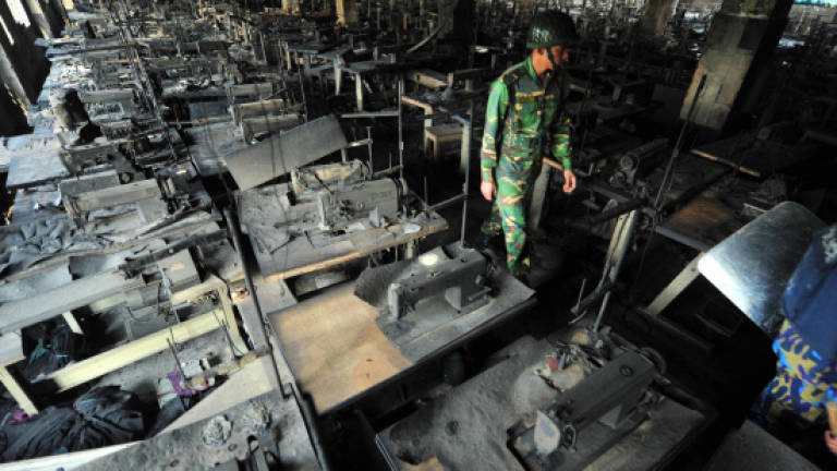 Bangladesh garment factory owners surrender over deadly fire