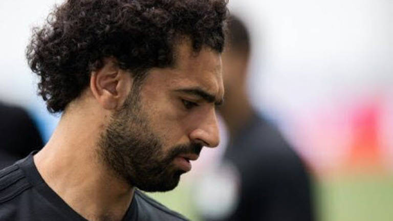 Salah's 30 days of hurt a sorry tale of two cities