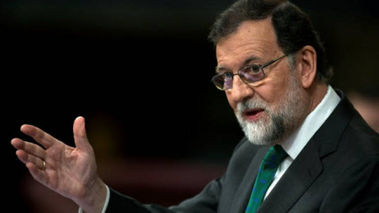 Spain PM fights for political life no-confidence debate begins