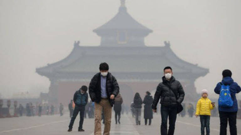 Top China weather expert warns on climate change