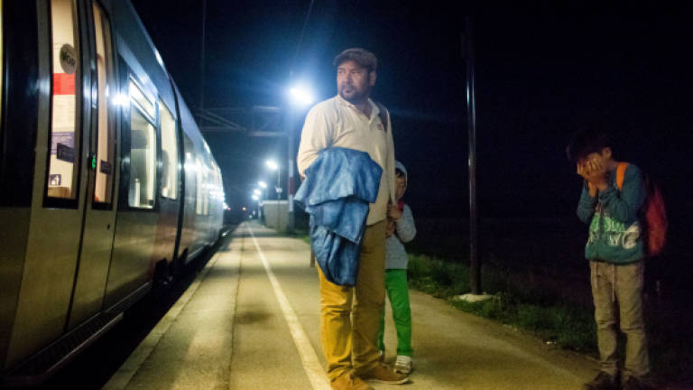 Migrants allowed to leave Budapest on trains for Austria, Germany: AFP