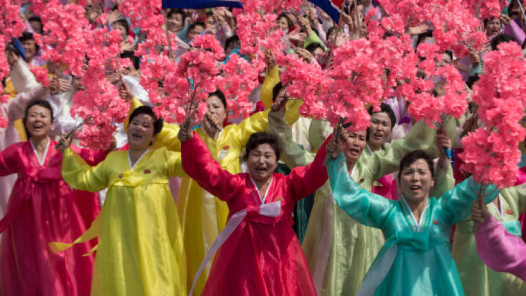 Kim family values on show at North Korea parade
