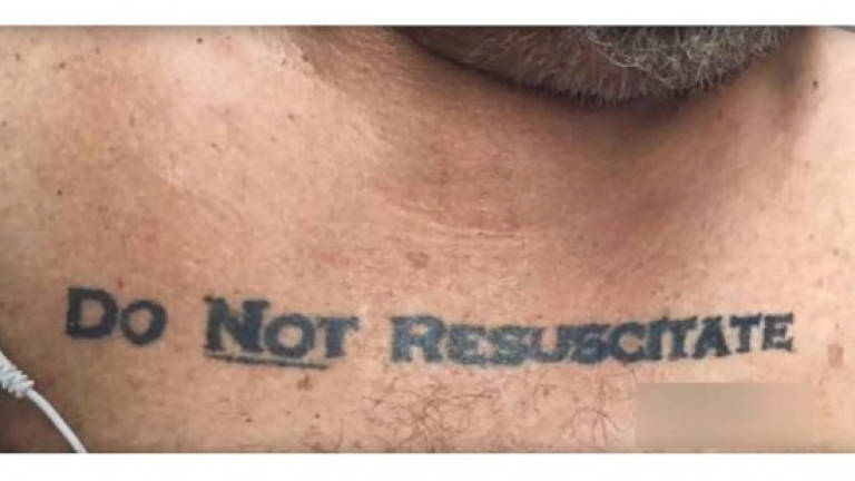 US man's tattoo leaves doctors with life-or-death dilemma