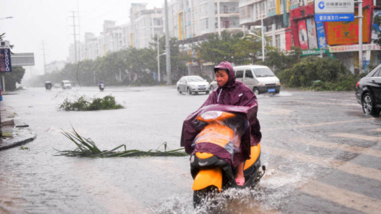 Philippine typhoon death toll nears 100, new storm brings rains